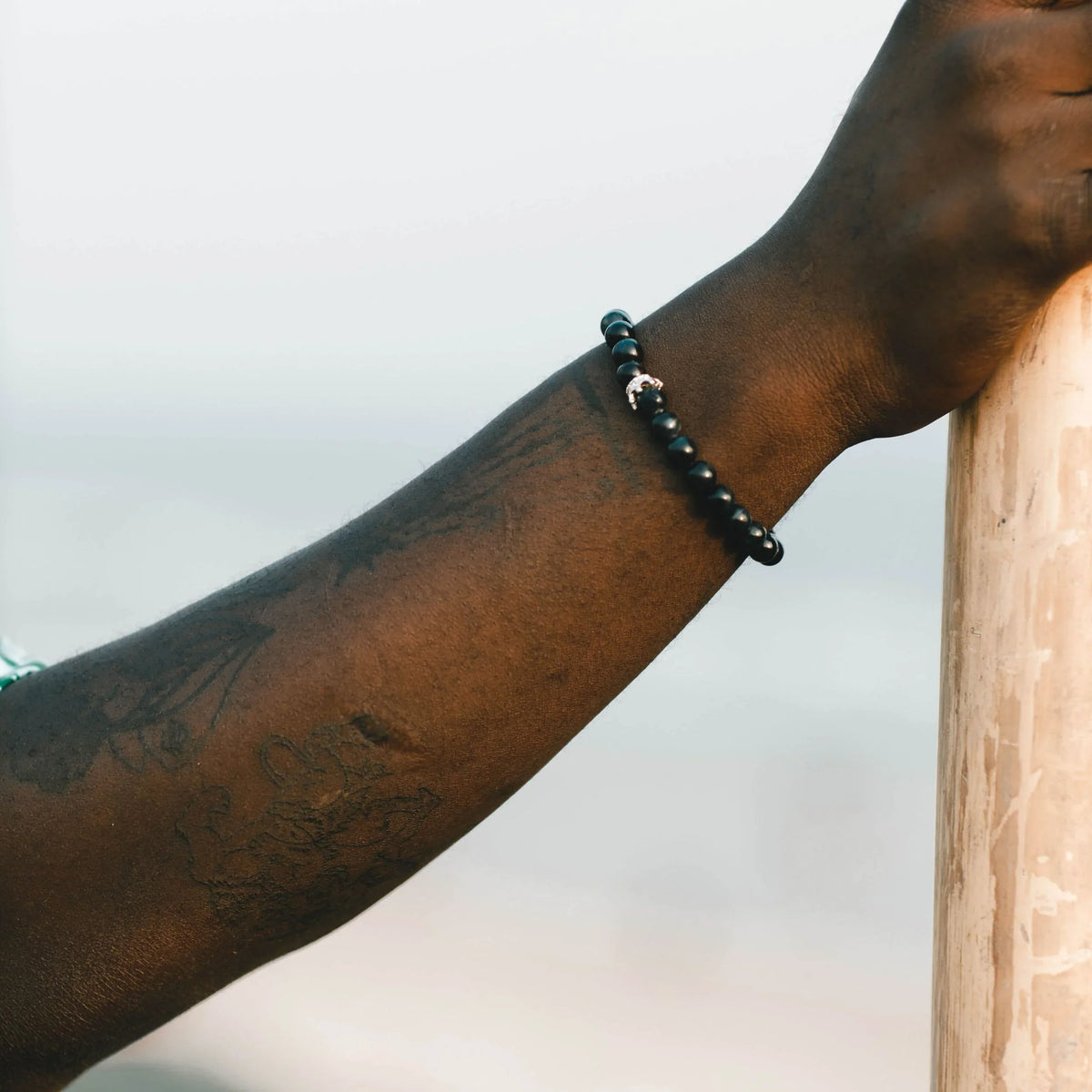Resilience, like the stones that comprise this bracelet, is rare. Featuring 8mm hand-selected Blue Tiger's Eye beads, each piece features a signature magnetic crown accent in .925 silver, secured by a precision-engineered twist-lock clasp. Presented in our signature purple velvet keepsake box.